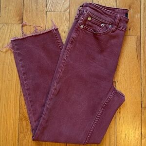 Calvin Klein burgundy color jeans.